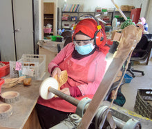 Load image into Gallery viewer, Finishing Handcrafted Olive Wood Fish Bowl with Beeswax