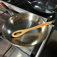 Load image into Gallery viewer, Olive Wood Sauce Spoon in Pan
